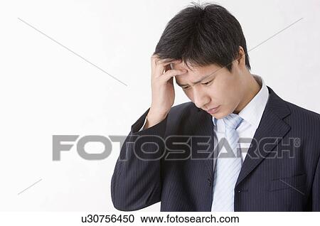 Portrait of man looking down with disappointment, Men, Facial Expression View Large Photo Image Stock Image - Portrait of man looking down with disappointment, Men, Facial Expression. Fotosearch