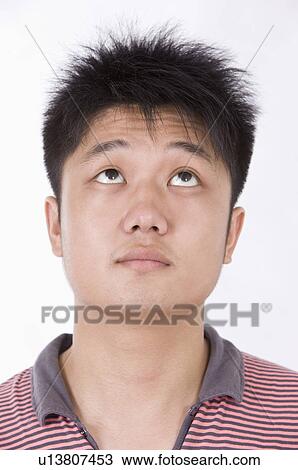Portrait of man looking up with disappointment, Men, Facial Expression View Large Photo Image Stock Image - Portrait of man looking up with disappointment, Men, Facial Expression. Fotosearch