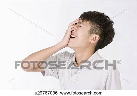 Stock Photograph - Portrait of man shouting with disappointment, Men, Facial Expression. Fotosearch