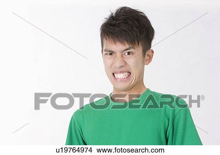Picture - Portrait of man sulking, Men, Facial Expression. Fotosearch