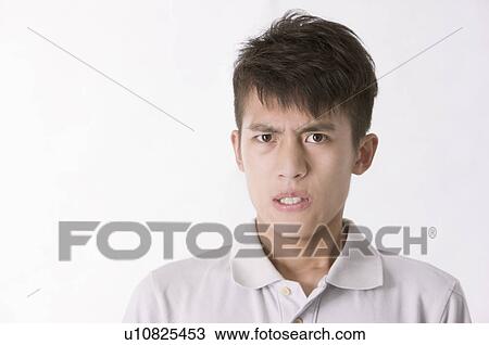 Portrait of man worrying and frowning, Men, Facial Expression View Large Photo Image Stock Image - Portrait of man worrying and frowning, Men, Facial Expression. Fotosearch