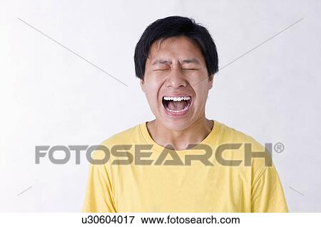 Portrait of man's fear face, Men, Facial Expression View Large Photo Image Stock Photo - Portrait of man's fear face, Men, Facial Expression. Fotosearch