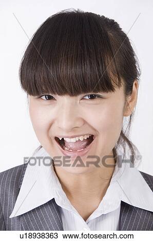 Portrait of woman laughing, Women, Facial Expression View Large Photo Image Stock Image - Portrait of woman laughing, Women, Facial Expression. Fotosearch