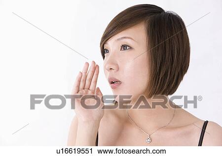 Portrait of woman looking away and telling secret, Women, Facial Expression View Large Photo Image Stock Image - Portrait of woman looking away and telling secret, Women, Facial Expression. Fotosearch