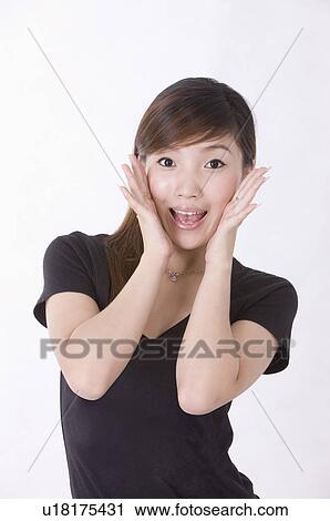 Portrait of woman smiling with head in hands, Women, Facial Expression View Large Photo Image Stock Image - Portrait of woman smiling with head in hands, Women, Facial Expression. Fotosearch