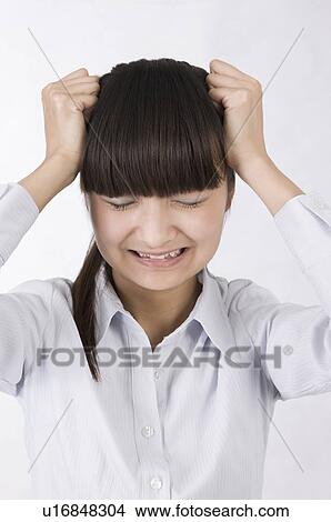 Picture - Portrait of woman worrying with eyes closed, Women, Facial Expression. Fotosearch