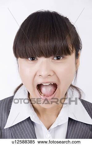 Portrait of woman's surprising face with mouth open, Women, Facial Expression View Large Photo Image Stock Photography - Portrait of woman's surprising face with mouth open, Women, Facial Expression. Fotosearch