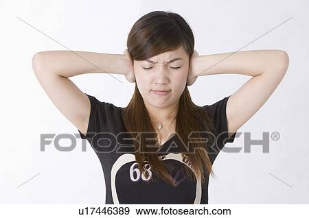 Portrait of worried woman frowning, Women, Facial Expression View Large Photo Image Stock Photo - Portrait of worried woman frowning, Women, Facial Expression. Fotosearch