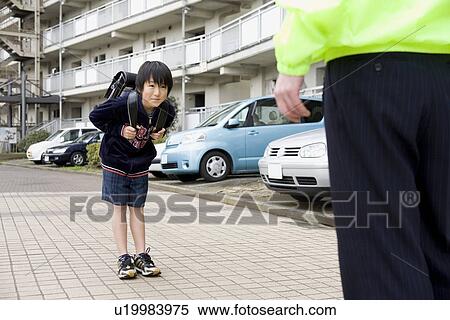 Stock Photography - Boy greeting super. Fotosearch