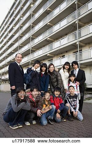 Stock Photo - Residents in housing complex. Fotosearch