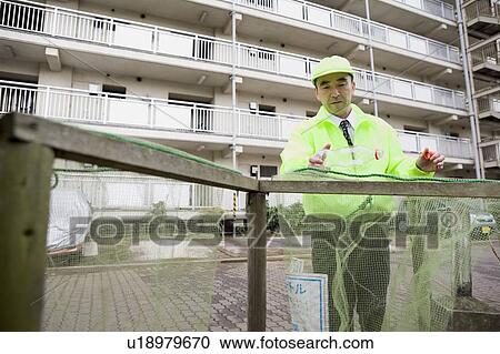 Stock Image - Super separating garbage. Fotosearch
