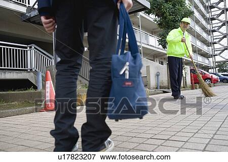 Stock Photo - Teenage boy greeting super. Fotosearch