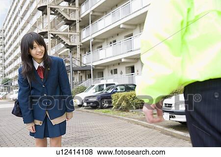 Stock Photo - Teenage girl greeting super. Fotosearch