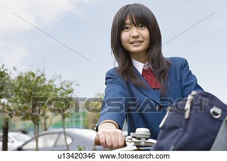 Teenage girl smiling View Large Photo Image Stock Photograph - Teenage girl smiling. Fotosearch
