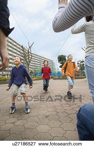 Three boys running to mothers View Large Photo Image Stock Photo - Three boys running to mothers. Fotosearch