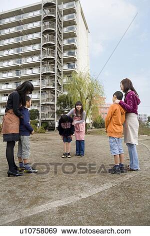 Stock Photo - Three families reconciling. Fotosearch