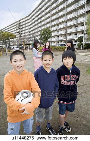 Three families standing View Large Photo Image Stock Photography - Three families standing. Fotosearch