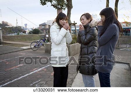 Three housewives standing in park View Large Photo Image Stock Image - Three housewives standing in park. Fotosearch