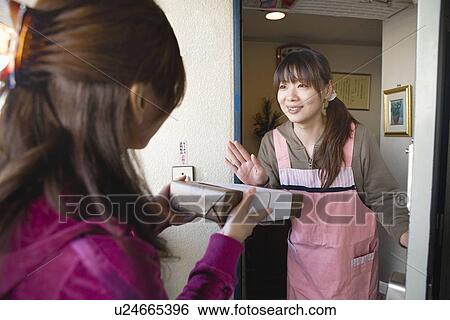 Woman refusing a gift View Large Photo Image Stock Photograph - Woman refusing a gift. Fotosearch