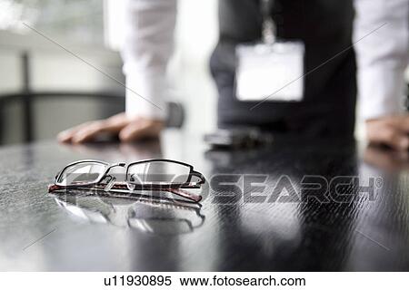 Stock Photography - Eyeglasses on the table. Fotosearch