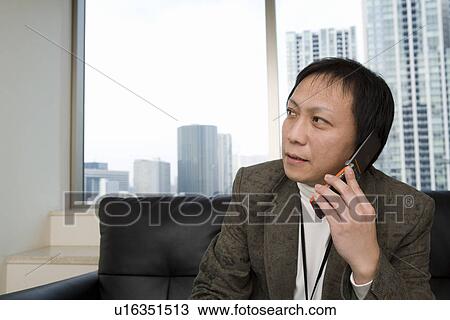 Mature man talking on cellular phone View Large Photo Image Stock Image - Mature man talking on cellular phone. Fotosearch