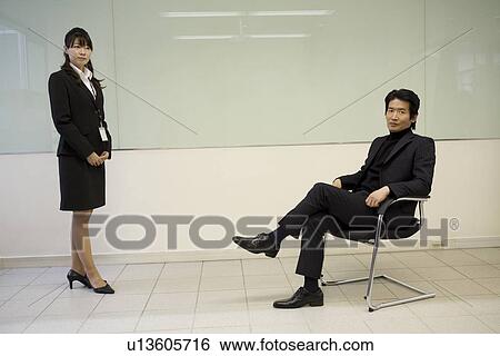 Portrait of mature man and young woman View Large Photo Image Stock Photograph - Portrait of mature man and young woman. Fotosearch