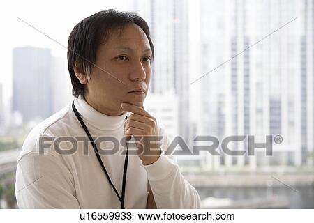 Stock Image - Portrait of mature man. Fotosearch