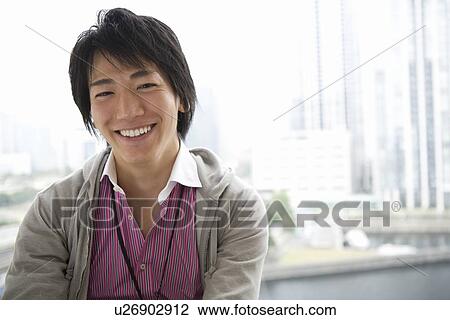 Stock Image - Portrait of young man. Fotosearch
