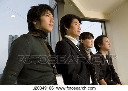 Profile of four business people View Large Photo Image Stock Photograph - Profile of four business people. Fotosearch