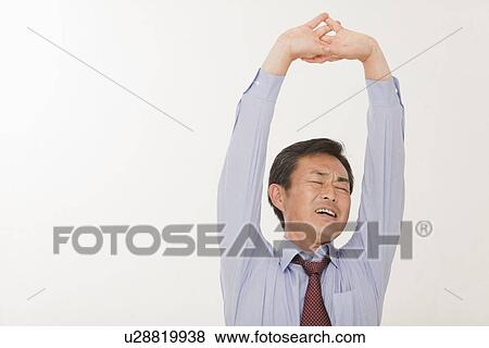 Mature man stretching View Large Photo Image Stock Photo - Mature man stretching. Fotosearch