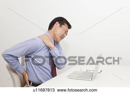 Mature man suffering from pain on shoulder and back View Large Photo Image Stock Image - Mature man suffering from pain on shoulder and back. Fotosearch