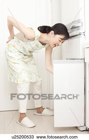 Stock Image - Mature woman exhausted. Fotosearch