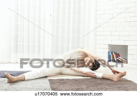 Mature woman stretching View Large Photo Image Stock Photography - Mature woman stretching. Fotosearch