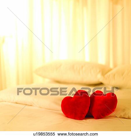 Stock Photography - Beds, Hearts, Romance, Bed, Cushions, Intimate, Heart. Fotosearch