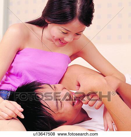 Female, Asian men, Intim, Men, Chinese, Asian man View Large Photo Image Stock Photo - Female, Asian men, Intim, Men, Chinese, Asian man. Fotosearch