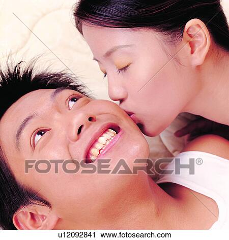 Stock Image - Oriental man, Oriental women, Female, Intim, Males, Energetic. Fotosearch