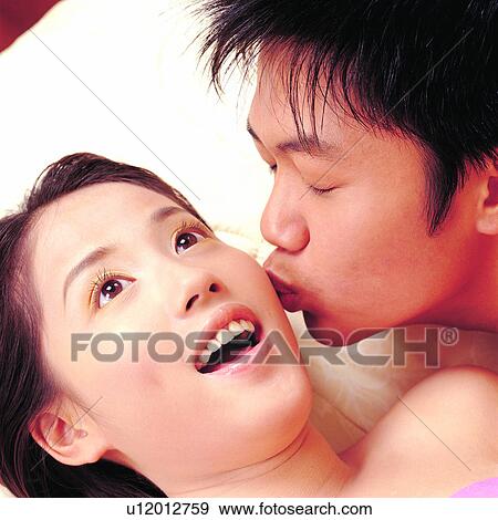 Stock Photo - Oriental woman, Male, Oriental man, Females, Men, Asian men. Fotosearch