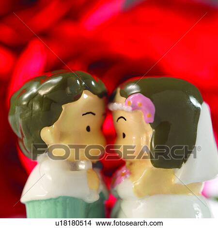 Red, Roses, Dolls, Males, Getting married, Marriage, Bliss View Large Photo Image Picture - Red, Roses, Dolls, Males, Getting married, Marriage, Bliss. Fotosearch