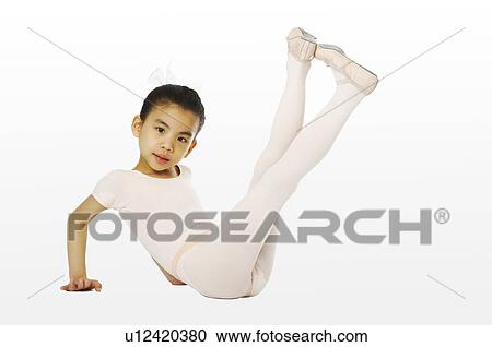 Stock Image - Girl alternating her legs. Fotosearch
