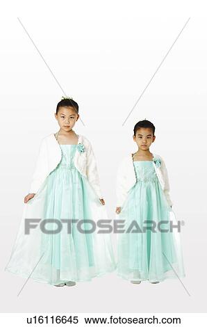 Stock Photography - Girl in green skirt hand in hand. Fotosearch