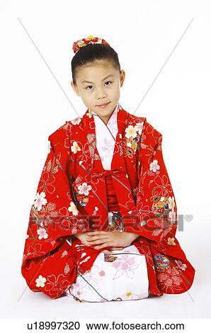 Girl in red kimono View Large Photo Image Stock Image - Girl in red kimono. Fotosearch