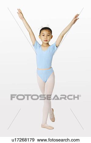 Stock Photo - Girl in rhythm clothes doing gymnastics. Fotosearch