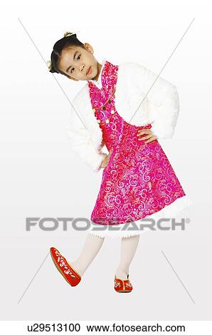 Stock Image - Girl in traditional dress warped tiptoe. Fotosearch