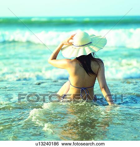 Bikini, Female, Summer Splash, Beautiful woman, Wave, Beautiful women, Straw hat View Large Photo Image Stock Photograph - Bikini, Female, Summer Splash, Beautiful woman, Wave, Beautiful women, Straw hat. Fotosearch