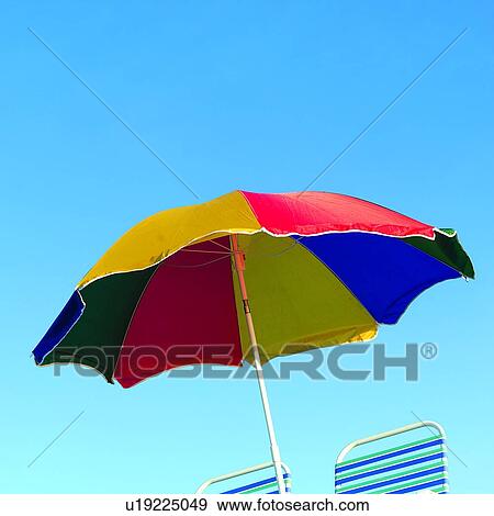 Couch, Couches, Summer Splash, Beach umbrellas, Sky, Beach umbrella, Blue sky View Large Photo Image Stock Photo - Couch, Couches, Summer Splash, Beach umbrellas, Sky, Beach umbrella, Blue sky. Fotosearch