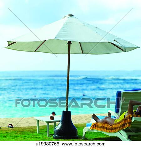 Stock Photograph - Couch, Water, Seas, Swimsuits, Sea, Oceans, Beach umbrella. Fotosearch