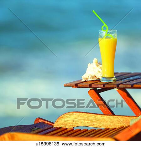 Couches, Summer Splash, Orange juice, Juice, Straw, Shell, Couch View Large Photo Image Stock Photography - Couches, Summer Splash, Orange juice, Juice, Straw, Shell, Couch. Fotosearch