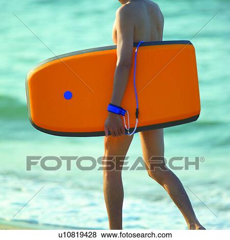 Males, Summer Splash, Male, Beaches, Oceans, Seas, Surfboard View Large Photo Image Stock Photo - Males, Summer Splash, Male, Beaches, Oceans, Seas, Surfboard. Fotosearch