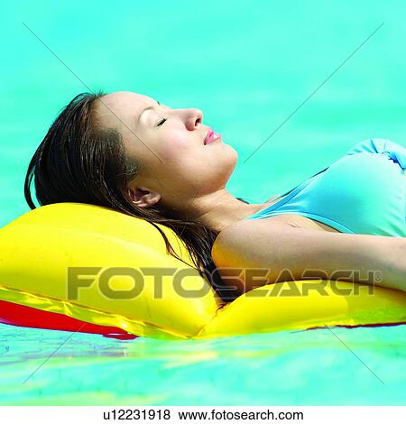 Oriental female, Air-cushion, Asian, Beautiful women, Chinese, Swimsuits, Swimsuit View Large Photo Image Stock Photo - Oriental female, Air-cushion, Asian, Beautiful women, Chinese, Swimsuits, Swimsuit. Fotosearch