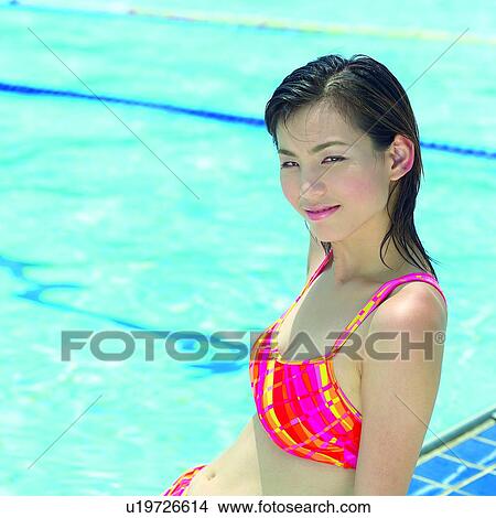 Picture - Oriental female, Woman, Water, Swimsuits, Women, Bikini, Chinese. Fotosearch
